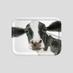 A black and white cow on a tray - by Charlotte Nicolin